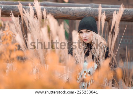 young girl of autumn nature