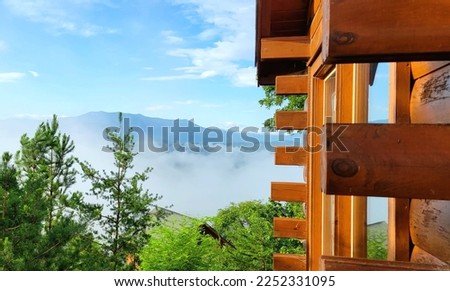 Cabin On A Mountain Top
