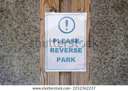 Reverse park please sign at public car park