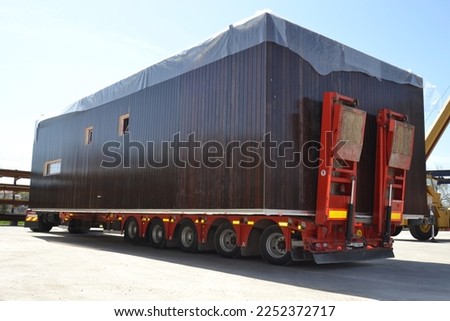 Modular Building Transportation Manufacturing Assembly Modularity Container House Modular Structures Tiny house Royalty-Free Stock Photo #2252372717