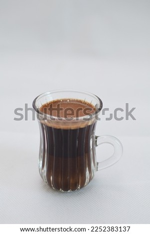 transparent turkish coffee cup isolated on white background black coffee  