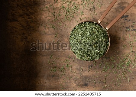 Dill Weed Spilled from a Teaspoon