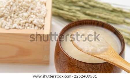 Amazake, rice koji .Amazake is a Japanese drink made from fermented sweet rice.Rice koji is Japanese malted rice. Royalty-Free Stock Photo #2252409581