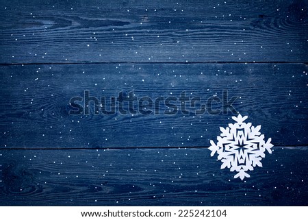 Christmas wooden background with snowflakes  