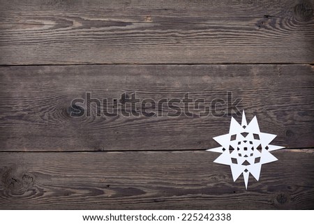 Christmas wooden background with snowflakes  