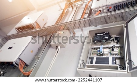 Instalation control of inverters solar panel on the wall. Technology of solar energy with shiny light.

 Royalty-Free Stock Photo #2252441107