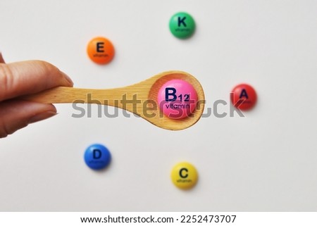 Vitamin B12 on a spoon. Food with a high content of vitamin B Royalty-Free Stock Photo #2252473707