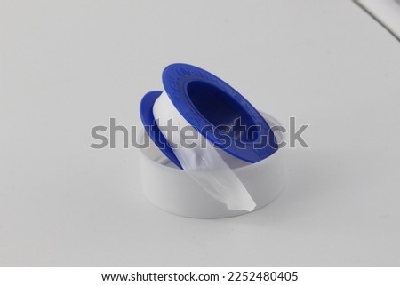 A picture of white tape for pipe replacement and bathroom construction in white isolated background 