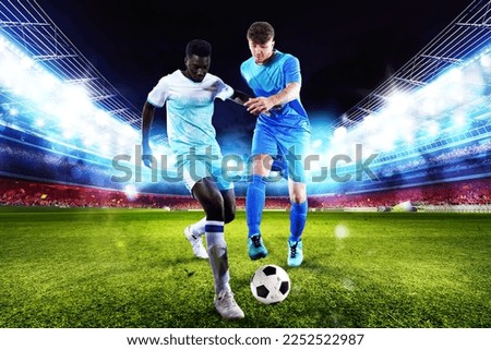 Football action scene with competing soccer players at the stadium