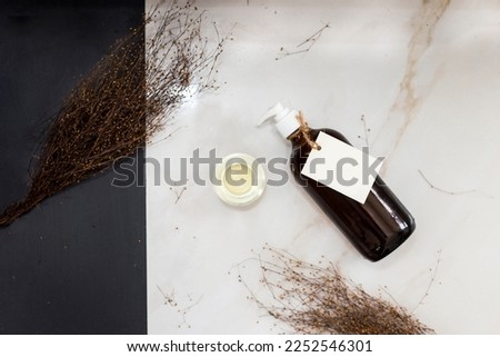 Oil bottle with empty tag, product photography