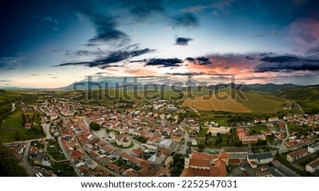 Aerial drone view of Podolinec, the town near Stara Lubovna, Slovakia, during sunset