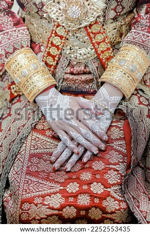 
Henna decoration on the hands of the bride as a sign that she has found a suitable partner to be friends for life forever