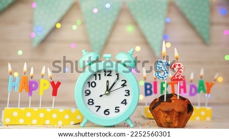 Happy birthday greeting card with muffin pie and retro clock on clock hands new birth. Beautiful background with decorations festive happy birthday decoration with number 52