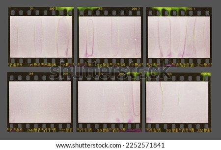 souped 35mm negative film strips, real scan of empty film material with scanning light interferences and developing smear marks, retro photo placeholder.