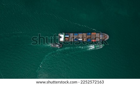 aerial photography cargo ship marine import and export international, global business and industry transportation concept,
