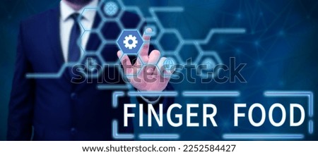Text caption presenting Finger Food. Conceptual photo products and digestives that is to be held with the fingers for eating