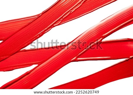 Cosmetic texture smudge red liquid lipstick. Swatches isolated on white