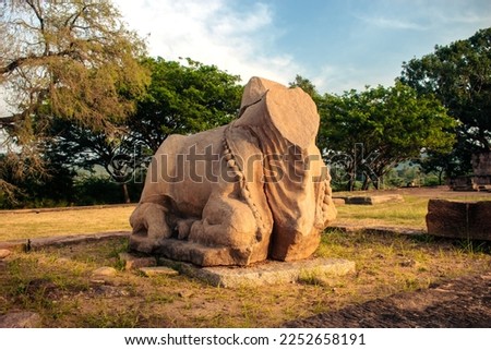Ancient ruined statue of Nandi at Pattadakal temple complex,Karnataka,India.