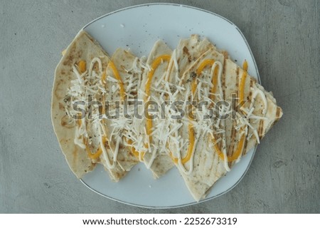 Quesadilla served on a plate