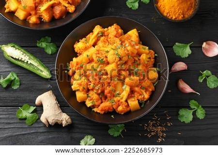 Aloo Gobi traditional Indian dish with cauliflower and potato Royalty-Free Stock Photo #2252685973