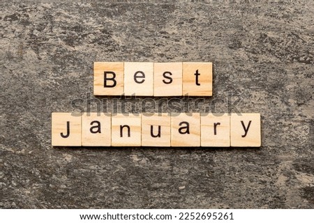 best january word written on wood block. best january text on table, concept.