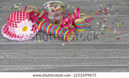 Party and carnival background with hat, streamers and confetti.