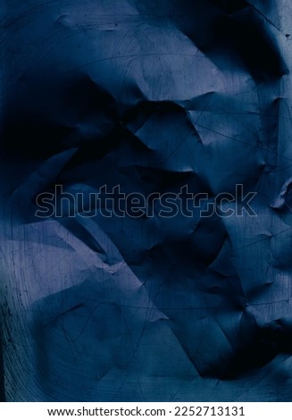 Scratched texture overlay. Worn paper. Creased noise. Blue black color grain dust on dark distressed gritty grunge abstract background.