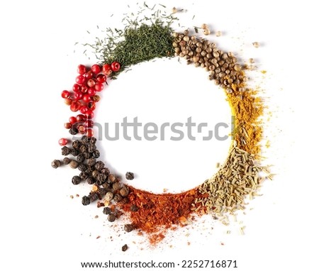 Mixed spice, red peppercorns, dry chopped dill, coriander seed, curry, rosemary, chopped hot pepper, black peppercorns isolated on white, top view  Royalty-Free Stock Photo #2252716871