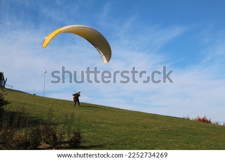 An old guy with a parachute at Samsun. High quality photo