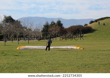 An old guy with a parachute at Samsun. High quality photo