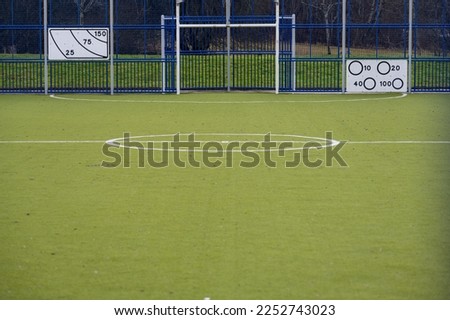 Football field with artificial grass.