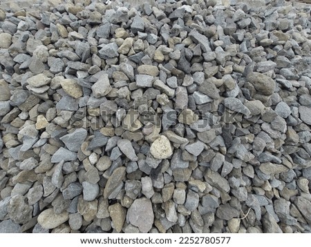 Ballast was placed between the sleepers, on the underside and on the sides of the railroad tracks Royalty-Free Stock Photo #2252780577