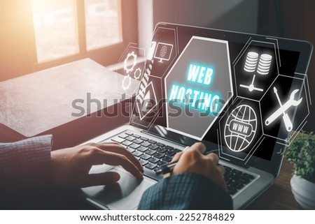Web hosting concept, Woman using computer and presses his finger on the virtual screen inscription Hosting on desk, Internet, business, Technology and network concept.