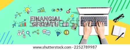 Financial growth with person using a laptop computer