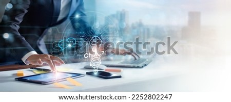 ChatGPT, Chat bot,  AI or Artificial Intelligence. Businessman working with smart assistant ChatGPT. AI on data global network connection cyber. developed by OpenAI. Royalty-Free Stock Photo #2252802247