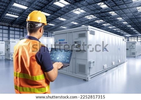 Engineer control energy storage system or battery container unit in factory Royalty-Free Stock Photo #2252817315