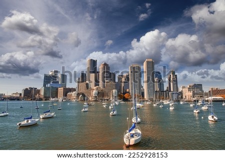 Boston Waterfront skyline. City buildings at sunset seen from Fort Point Channel, Massachusetts, USA Royalty-Free Stock Photo #2252928153