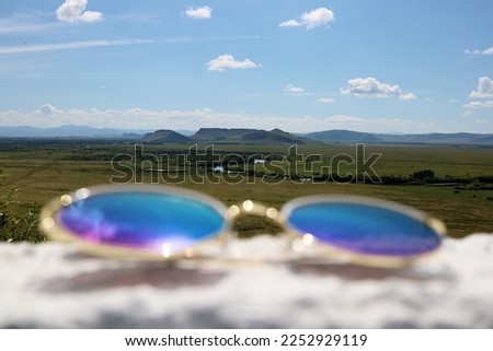 Sunglasses on the background of the National Park Chests