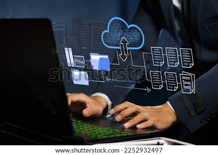 businessman using Document Management System ( DMS ) software which faster, save time and money   to set business strategy Royalty-Free Stock Photo #2252932497