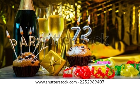 Happy birthday background with champagne glasses with number cake  72. Beautiful birthday card with decorations copy space.