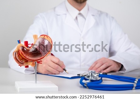 mockup stomach on work desk of doctor Royalty-Free Stock Photo #2252976461