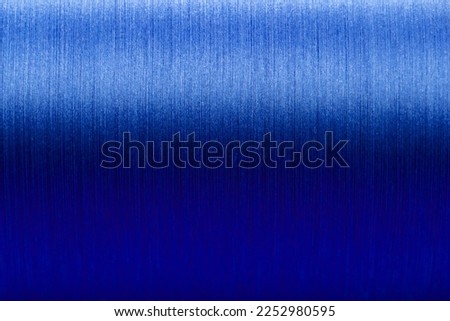 Closed up of blue color of thread textured background (Focus at center of picture) Royalty-Free Stock Photo #2252980595