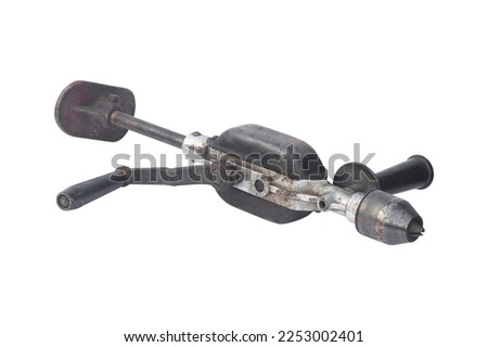 old mechanical hand drill isolated from the background