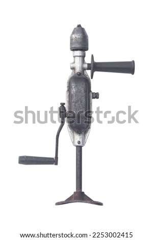 old mechanical hand drill isolated from the background