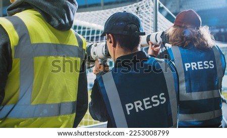 Professional Press Officer, Sports Photographers with Camera Zoom Lens Shooting Football Championship Match on Stadium. International Cup, World Tournament Event. Photography, Journalism, Media