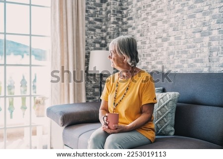 Face of senior caucasian hoary woman looking away deep in sad thoughts feels lonely close up portrait, recollect memories and life moments, depressed grandmother alone indoors, yearning for husband Royalty-Free Stock Photo #2253019113