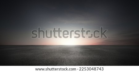 Dark Street Floor Background with Sunset Sky Horizon