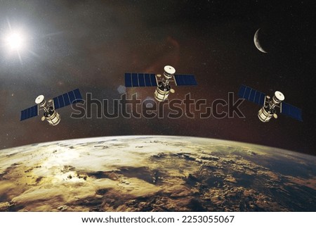 Satellites on low-Earth orbit. Elements of this image furnished by NASA. Royalty-Free Stock Photo #2253055067
