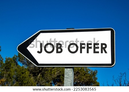 the word 'job offer' written on a road sign