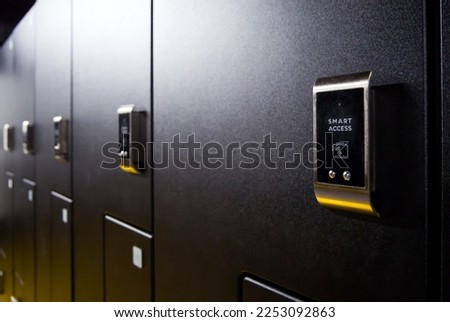 Modern lockers in the locker room equipped with proximity locks (Shallow depth of field) Royalty-Free Stock Photo #2253092863